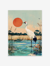 Japanese Red-crowned Crane standing in a wetland with tall grasses and a large red sun in Ukiyo-e style art print.