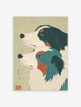 Japanese dog wall art print showing two stylized dogs, one black and white, the other blue and white, with orange accents.