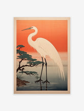 Japanese Egret Wall Art print showing a white egret in water with a pine tree against an orange sunset sky.