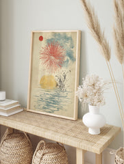 Japanese fireworks wall art with a red sun, red firework explosion, blue clouds, yellow water reflection, and reeds. - Image 3
