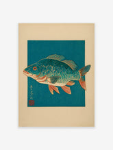 Traditional Japanese woodblock print featuring a vibrant blue fish with a red eye and orange fins, set against a deep teal background.