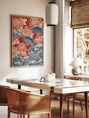 Japanese-style print with red background, blue folding fans, and cream-coloured chrysanthemum, in a styled room mockup