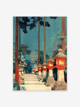 Traditional Japanese Forest Art print with a path lined by red glowing stone lanterns and tall pine trees under a twilight blue sky.