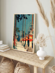 Traditional Japanese Forest Art print with a path lined by red glowing stone lanterns and tall pine trees under a twilight blue sky. - Image 3