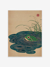 Japanese Ukiyo-e style frog art print featuring a green frog in a pond with water ripples and tall grass.