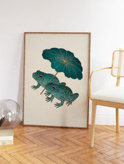Japanese frog art print showing two teal frogs with patterned skin holding a large green lotus leaf as an umbrella. - Image 2