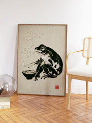 Illustrative Japanese frog art print of a dark green frog eating ramen noodles with chopsticks, with steam rising. - Image 2