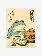 Vintage Japanese frog wall art illustration of a green frog drinking tea from a cup, with an orange teapot and calligraphy.