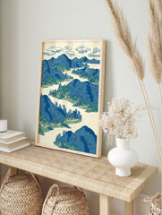 Japanese landscape art print showing blue mountains, green trees, rivers, and villages in traditional woodblock style. - Image 3