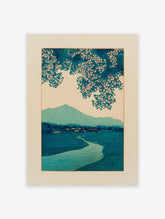 Japanese landscape woodblock print with teal river, mountains, and pink cherry blossoms on a light background.