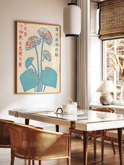 Japanese woodblock print of blue lotus flowers with red patterns and leaves, with Kanji text on a, in a styled room mockup