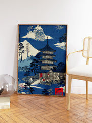 Traditional Japanese Pagoda Wall Art in a serene blue and white landscape with mountains, trees, and a temple design. - Image 2