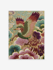 Embroidered Japanese phoenix bird with colorful wings and tail feathers amidst teal and purple floral patterns.