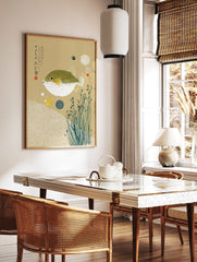 Japanese pufferfish art print with green spotted fugu, yellow fins, white waves, kanji text on, in a styled room mockup
