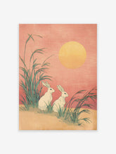 Japanese Rabbit Print featuring two white rabbits in tall green grass under a large yellow moon against a pink sky