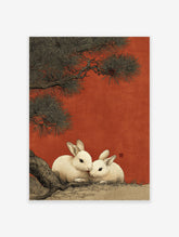 Japanese rabbit art print showing two white rabbits under a dark pine tree against a textured red background, in an illustrative style.