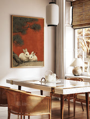 Japanese rabbit art print showing two white rabbits under a dark pine tree against a textured red background, in an illustrative style. - Image 2