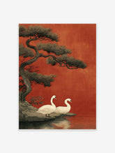 Japanese Swan Wall Art print showing two white swans by a lake with a large pine tree against a red background.