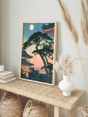 Japanese temple pagoda landscape art print with a full moon and gnarled pine tree in an, in an alternate framed mockup