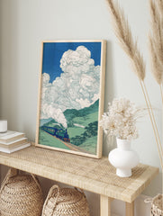 Japanese Train Print depicting a blue train with steam, traveling through green mountains under a bright blue sky with white clouds. - Image 3