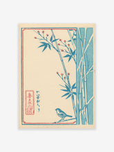 Japanese woodblock style art print with blue bamboo, red berries, and a small bird on a cream background with red and blue borders.