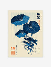 Japanese wall art print featuring two blue fish under large blue lotus leaves with rain lines on a cream background