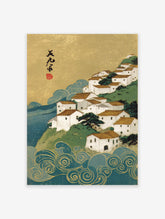 Japanese Wall Art print in Ukiyo-e style depicting a white coastal village on a green hill, with golden sky and blue waves.