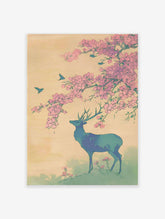 Japanese wall art print of a blue-green deer under pink cherry blossoms with flying birds against a pale yellow sky.