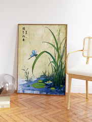 Japanese botanical art print showing a blue dragonfly on a green leaf above a pond with lily pads and a white flower. - Image 2