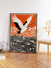 Japanese wall art print of a white and black crane flying over orange and black stylized waves against an orange sky. - Image 2