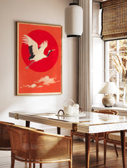 Traditional Japanese wall art print of a white and black flying crane against a large red sun and orange sky. - Image 3