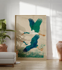 Japanese Ukiyo-e wall art print showing two teal and white flying cranes over vibrant blue-green ocean waves and script. - Image 3