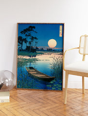 Japanese Ukiyo-e style wall art print featuring a serene moonlit landscape with a boat on a calm lake and tall reeds. - Image 2