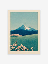 Japanese landscape wall art featuring Mount Fuji, a lake, and pink cherry blossoms in a traditional woodblock print style.