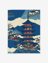 Japanese pagoda wall art print with traditional houses, blue mountains, and trees in a classic Ukiyo-e style.