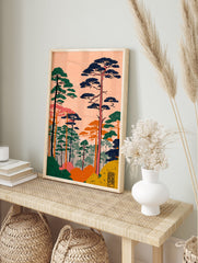 Japanese Wall Art print featuring a stylized pine forest landscape with green, blue, orange trees against a peach sky. - Image 3