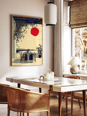 Japanese wall art print of an outdoor dining patio with a red sun, dark pergola, green vines, and ocean view. - Image 2