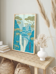 Japanese Wall Art print of a serene mountain landscape with traditional pagodas, cascading waterfall, and stylized pine trees. - Image 3