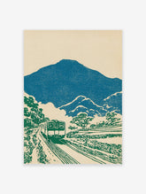 Japanese wall art print of a green train traveling through a blue mountain and green tree landscape with a cream background.