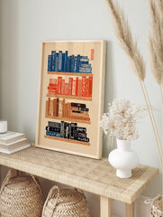 Japanese wall art print depicting stacked bookshelves with traditional Ukiyo-e style books in blue, red, and brown. - Image 3