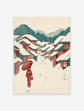 Japanese winter village wall art with snow-covered red-roofed houses, mountains, and a person in a red kimono with an umbrella.