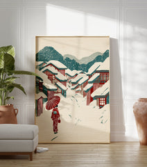 Japanese winter village wall art with snow-covered red-roofed houses, mountains, and a person in a red kimono with an umbrella. - Image 3