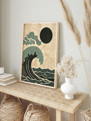 Stylised Japanese wave wall art with dark teal and black ocean, black sun, and cream, in an alternate framed mockup