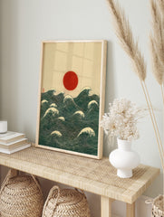 Red sun rising over deep blue-green ocean waves with white crests, Japanese woodblock style, in an alternate framed mockup