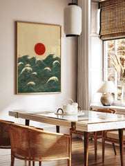 Red sun rising over deep blue-green ocean waves with white crests, Japanese woodblock style print, in a styled room mockup