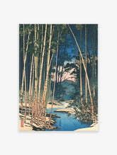 Japanese woodblock print of a serene bamboo forest in winter with a blue stream and snowy ground.