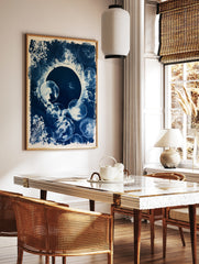 Cyanotype print of jellyfish and botanical silhouettes in deep blue and white, arranged in a, in a styled room mockup