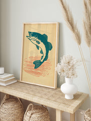 Vintage jumping fish poster featuring a teal bass leaping from water with red ripples on a light beige background. - Image 4