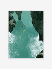 Aerial view of four yellow kayaks on a turquoise river canyon with dark rocky cliffs and white water