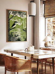 Linocut style kingfisher bird perched on a branch by a river, surrounded by green trees and foliage, in a styled room mockup